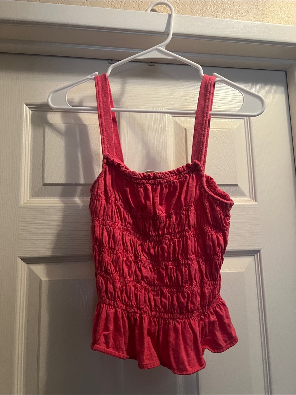 Womens Sleeveless Smocked Tank Top in Bright Pink